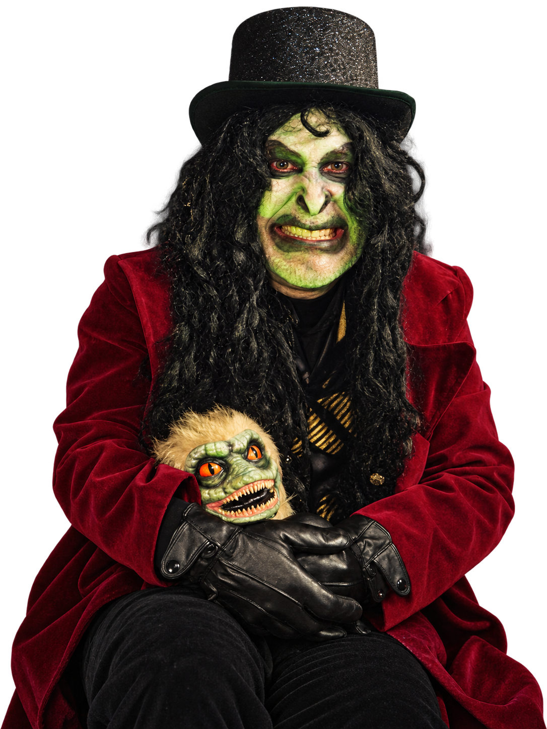 Master DisGracey grinning in his glittering top hat and red velvet coat, with a mischievous little monster on his lap.
